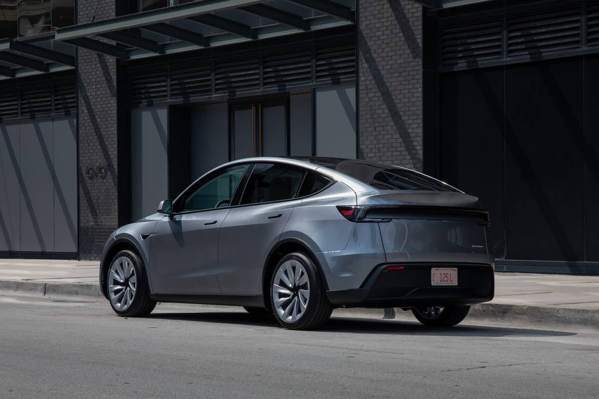 tesla model y long range awd 2025 14 exterior rear angle scaled jpg