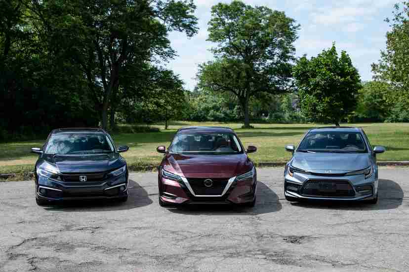 A 2020 Toyota Corolla, 2020 Nissan Sentra and 2020 Honda Civic parked in a row