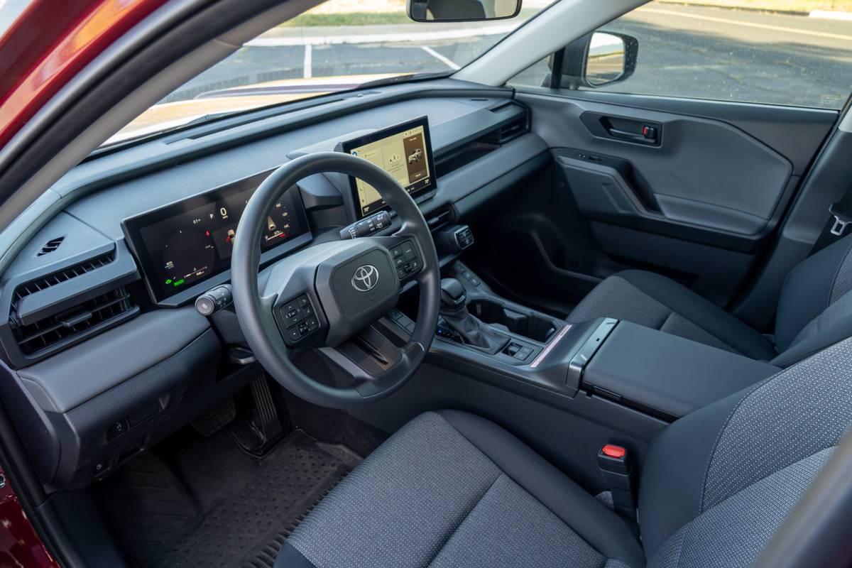 toyota rav4 hybrid le awd 2026 13 interior front row 1 scaled jpg
