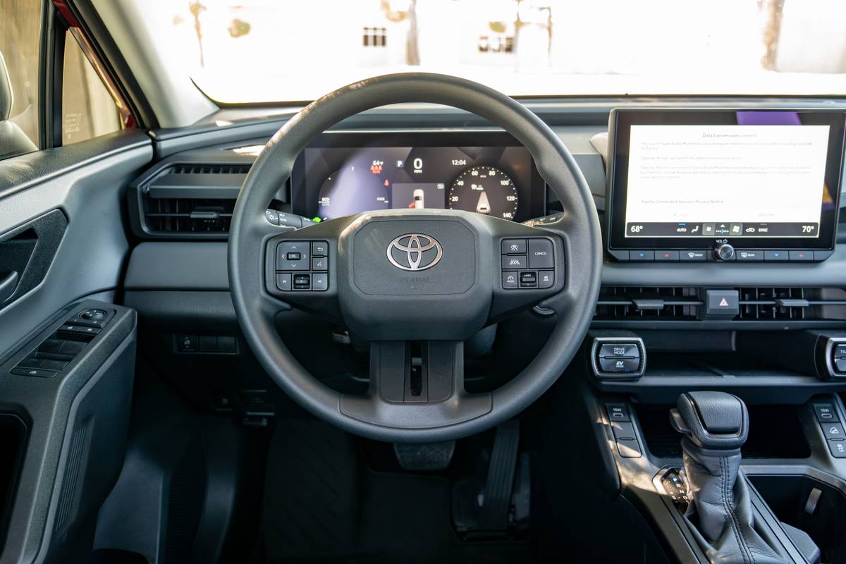 toyota rav4 hybrid le awd 2026 14 interior steering wheel 1 scaled jpg