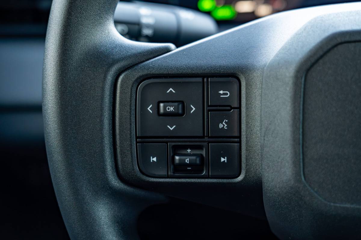 toyota rav4 hybrid le awd 2026 15 interior steering wheel buttons 1 scaled jpg