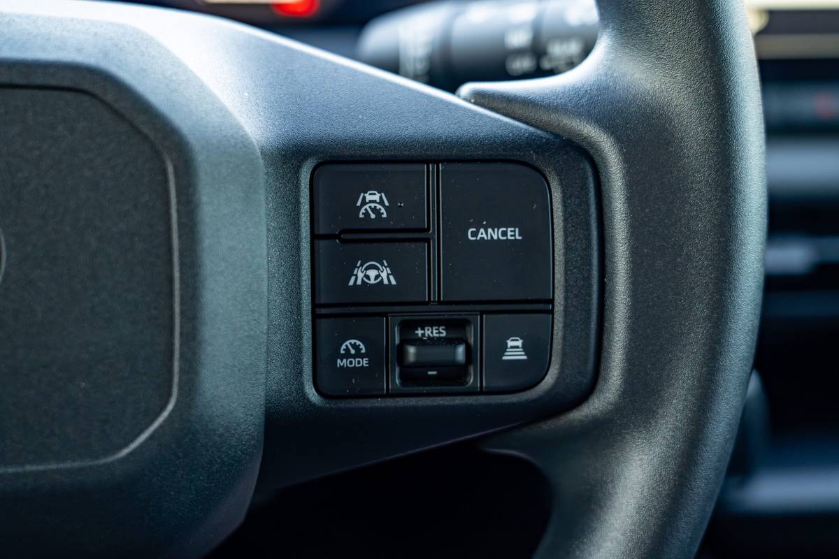 toyota rav4 hybrid le awd 2026 16 interior steering wheel buttons 1 scaled jpg