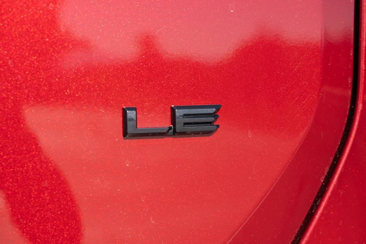 toyota rav4 hybrid le awd 2026 36 exterior badge detail jpg