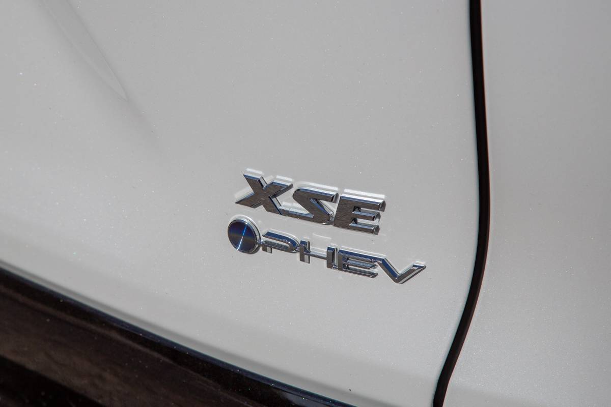 toyota rav4 plug in hybrid xse 2025 08 exterior rear badge jpg