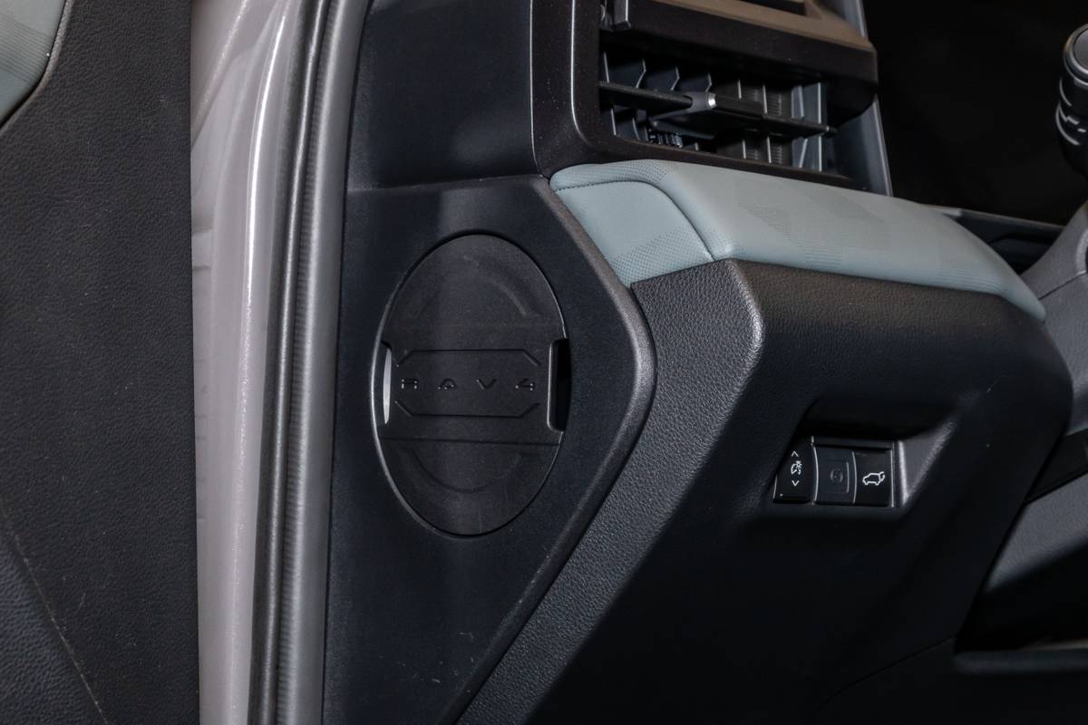 toyota rav4 woodland 2026 111 interior dashboard badge jpg