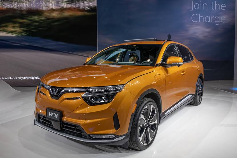 vinfast-vf-8-2023-02-exterior-front-angle-orange-suv