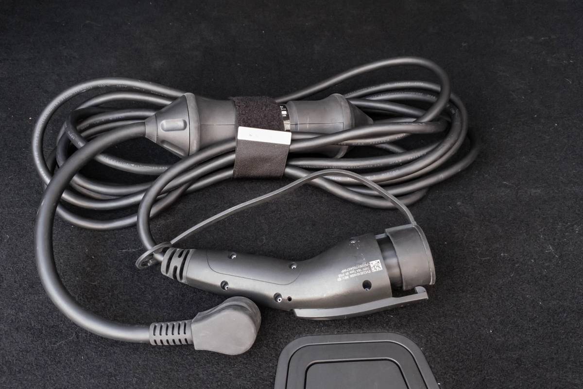 2021 Volvo XC60 Recharge included 120-volt charging cable | Cars.com photo by Joe Wiesenfelder